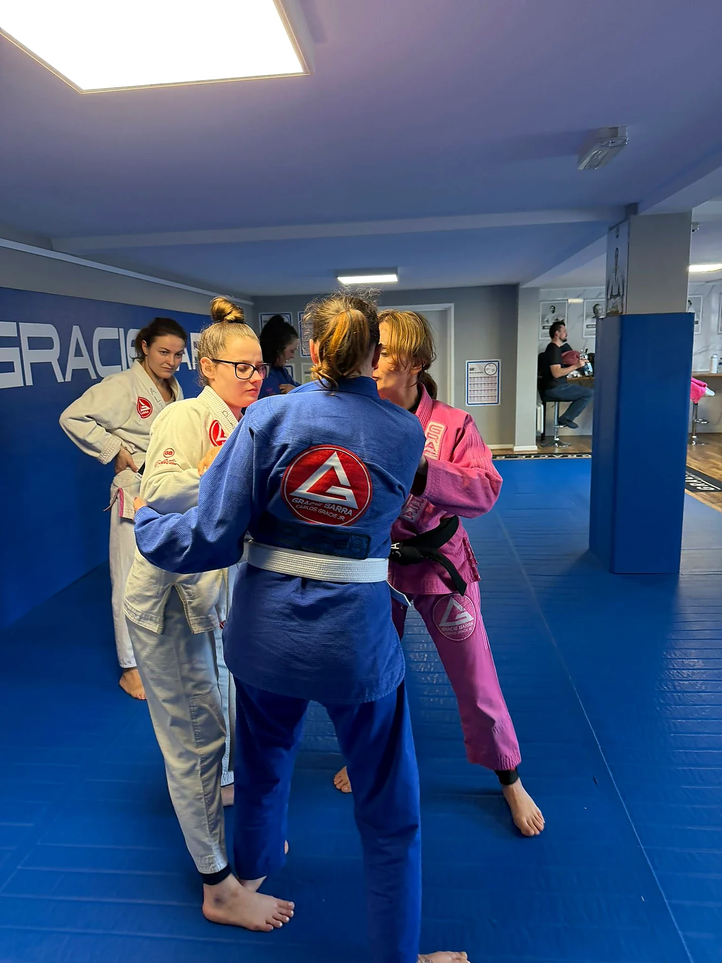 Women training Brazilian Jiu‑Jitsu